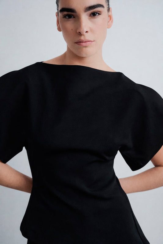BLUSA COM MANGAS BUFANTES