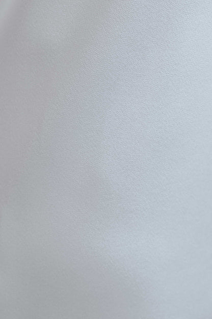 BLUSA DE CREPE ASSIMÉTRICO