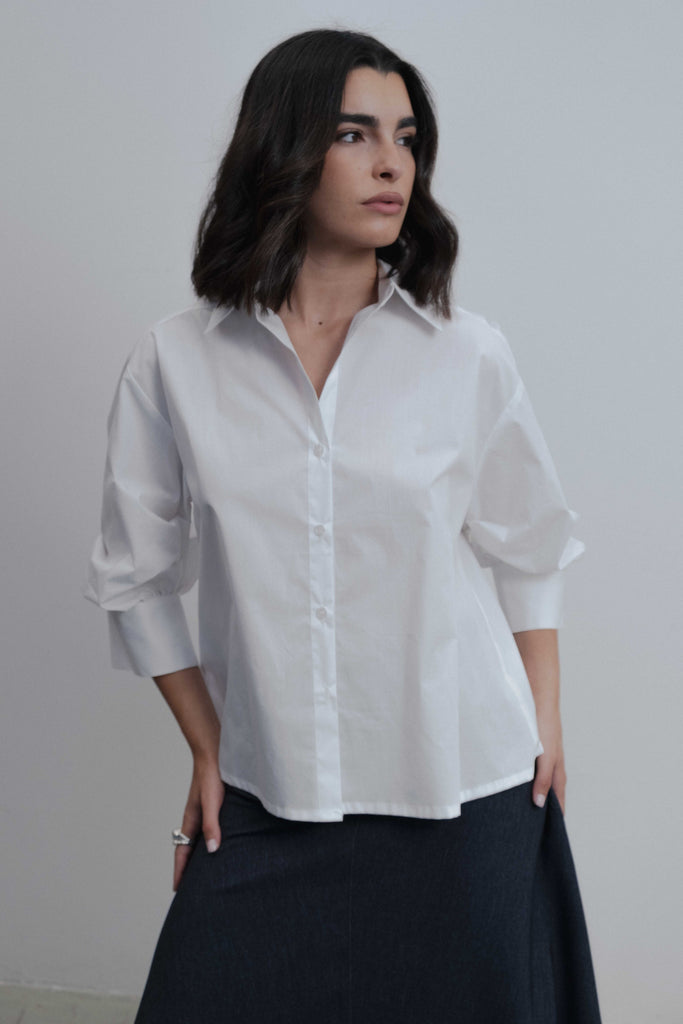 CAMISA COM MANGAS BUFANTES