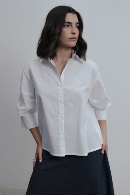 CAMISA COM MANGAS BUFANTES