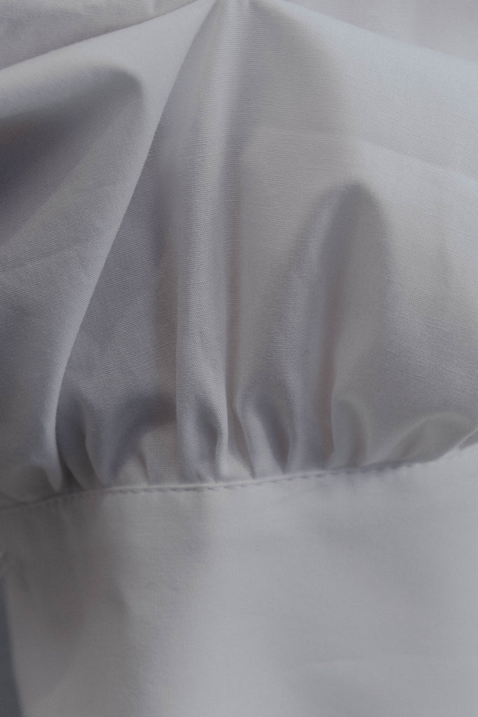 CAMISA COM MANGAS BUFANTES